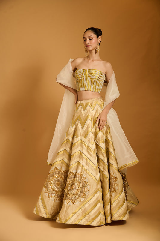 Trifecta cream-gold chevron lehenga
