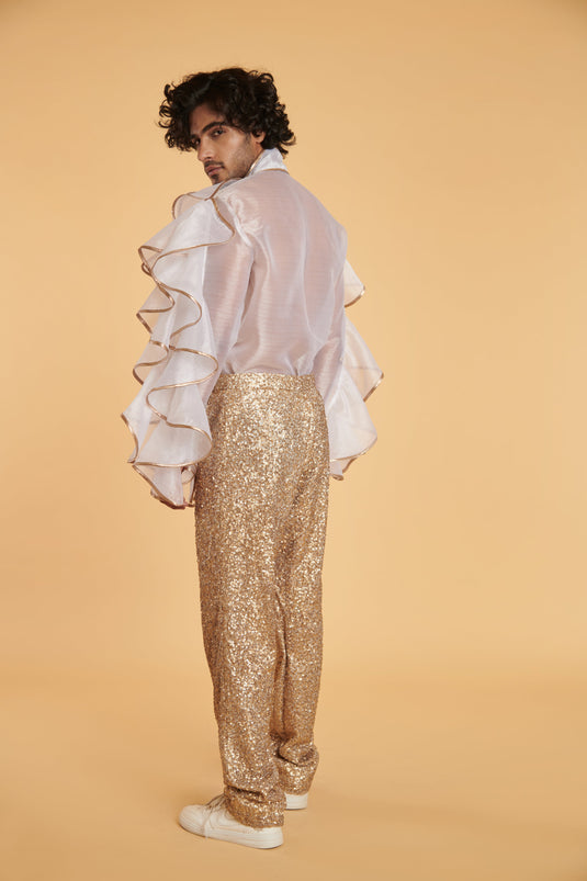 GENERATION GOLD Gilded bling-bling formals him.