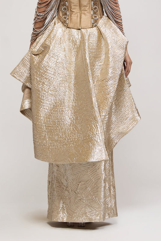 Unapologetic gold bustle skirt