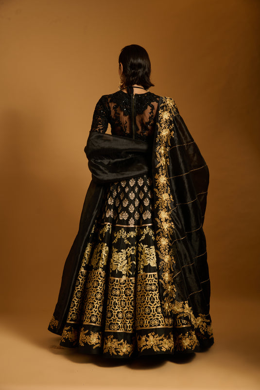 Trifecta black gold zari lehenga