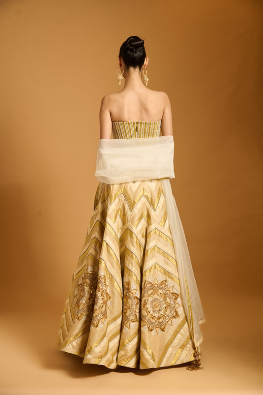 Trifecta cream-gold chevron lehenga