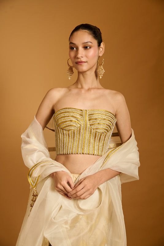 Trifecta cream-gold chevron lehenga