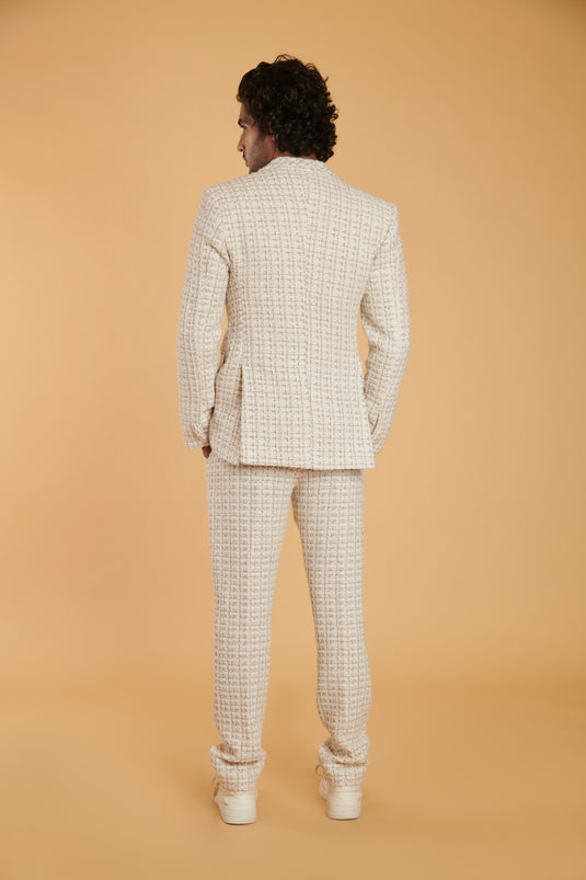Gilded vanilla tweed formal.